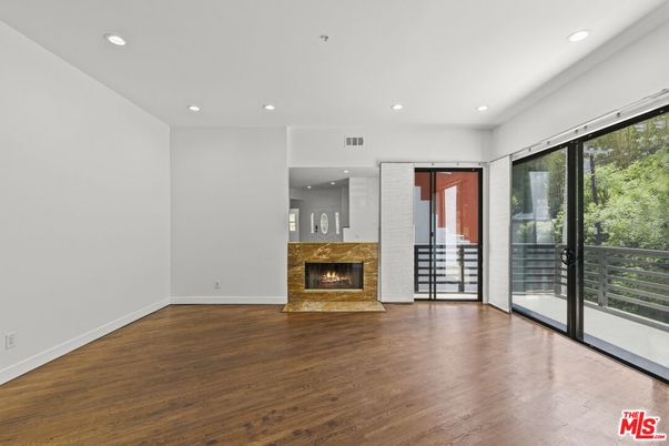 Empty room, Fireplace, Interior, Recessed Lighting, Wood Texture Flooring