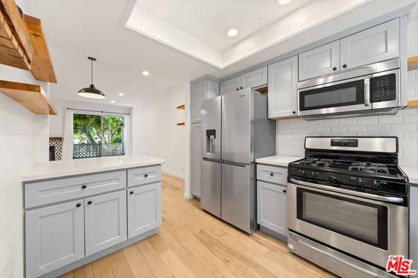 Interior, Kitchen, Pendant Lights, Recessed Lighting, Stainless Steel Appliances, Wood Texture Flooring