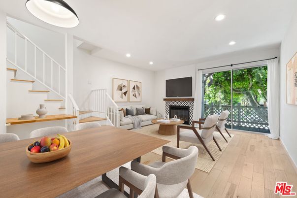 Dining room, Fireplace, Interior, Living room, Recessed Lighting, Wood Texture Flooring