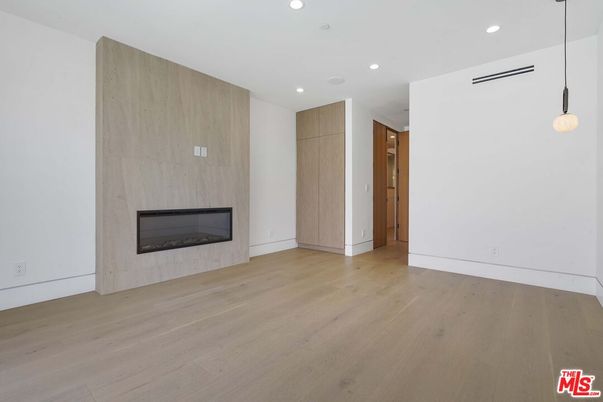 Empty room, Fireplace, Interior, Pendant Lights, Recessed Lighting, Wood Texture Flooring