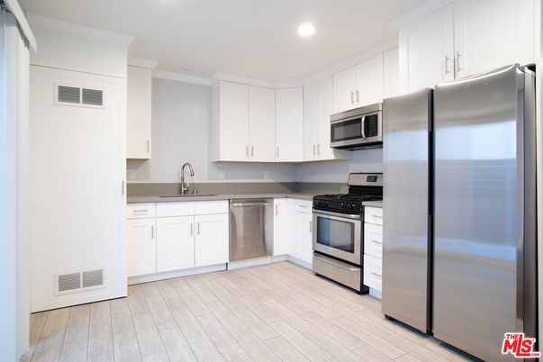 Interior, Kitchen, Recessed Lighting, Stainless Steel Appliances, Wood Texture Flooring