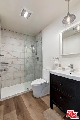 Bathroom, Glass Shower, Interior, Marble Walls, Pendant Lights, Wood Texture Flooring