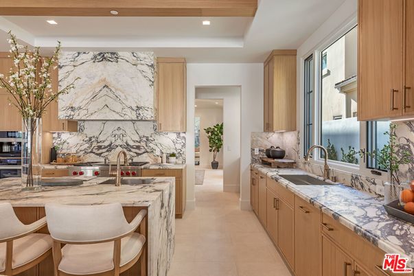 Interior, Kitchen, Marble Walls, Recessed Lighting, Stainless Steel Appliances