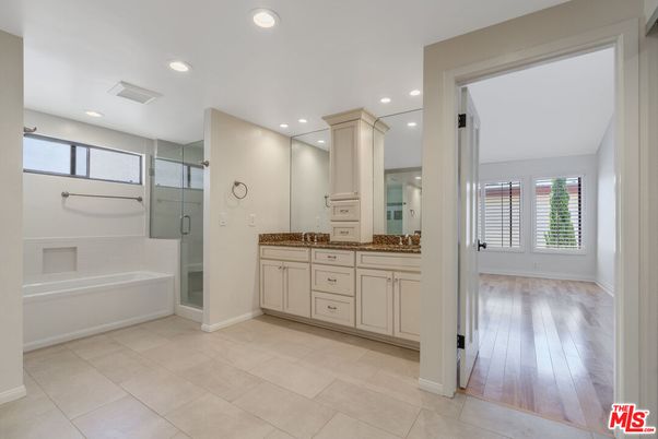 Bathroom, Dual Sink Vanities, Glass Shower, Interior, Recessed Lighting, Wood Texture Flooring