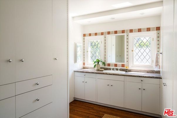 Bathroom, Dual Sink Vanities, Interior, Recessed Lighting, Wood Texture Flooring