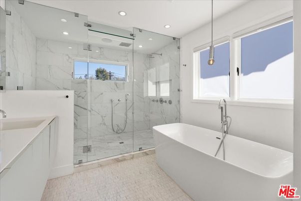 Bathroom, Free Standing Baths, Glass Shower, Interior, Marble Walls, Pendant Lights, Recessed Lighting
