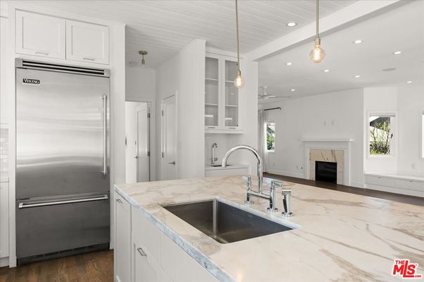 Fireplace, Interior, Kitchen, Pendant Lights, Recessed Lighting, Stainless Steel Appliances, Wood Texture Flooring