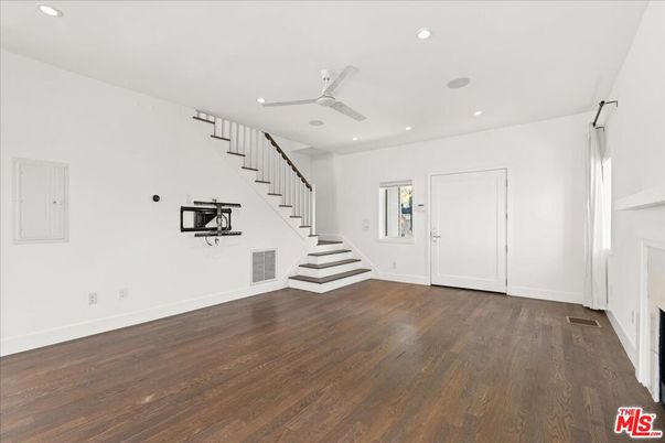 Empty room, Fireplace, Interior, Recessed Lighting, Wood Texture Flooring