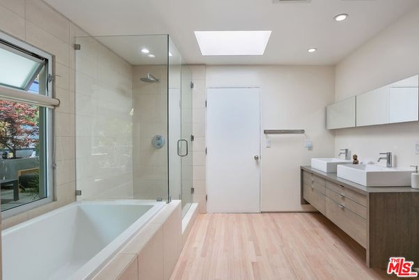 Bathroom, Dual Sink Vanities, Glass Shower, Interior, Recessed Lighting, Wood Texture Flooring