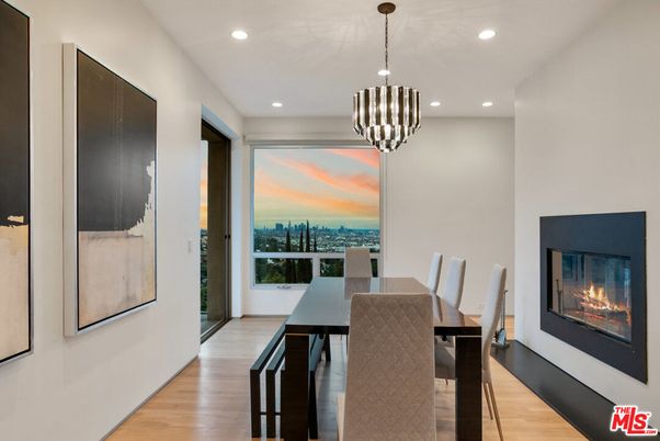 Dining room, Fireplace, Interior, Pendant Lights, Recessed Lighting, Water, Wood Texture Flooring
