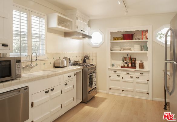 Interior, Kitchen, Stainless Steel Appliances, Tile Countertops, Wood Texture Flooring