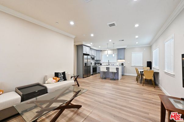 Dining room, Interior, Kitchen, Pendant Lights, Recessed Lighting, Stainless Steel Appliances, Wood Texture Flooring