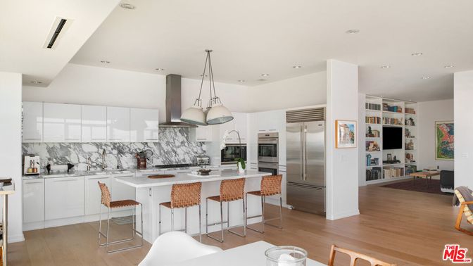Interior, Kitchen, Marble Walls, Pendant Lights, Recessed Lighting, Stainless Steel Appliances, Wood Texture Flooring