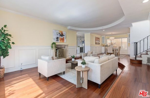 Dining room, Fireplace, Interior, Living room, Recessed Lighting, Wood Texture Flooring