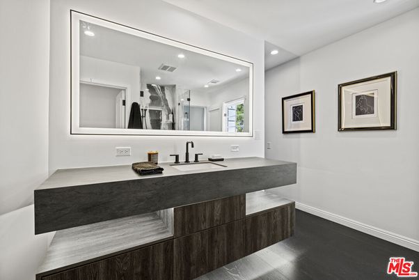Bathroom, Dual Sink Vanities, Interior, Recessed Lighting, Wood Texture Flooring