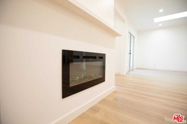 Fireplace, Interior, Recessed Lighting, Wood Texture Flooring