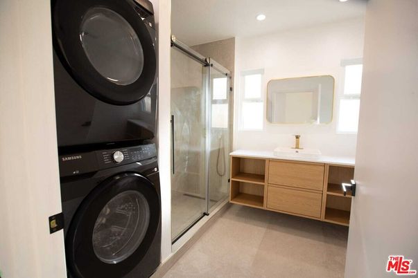 Bathroom, Dual Sink Vanities, Glass Shower, Interior, Recessed Lighting, Utility Closets, Washer