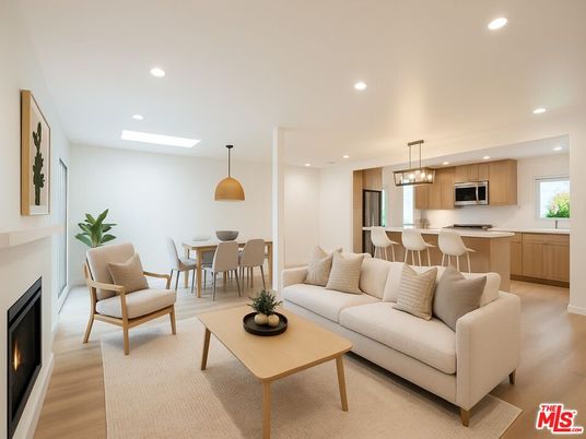 Dining room, Fireplace, Interior, Kitchen, Living room, Pendant Lights, Recessed Lighting, Stainless Steel Appliances, Wood Texture Flooring