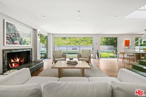 Dining room, Fireplace, Interior, Living room, Recessed Lighting, Wood Texture Flooring