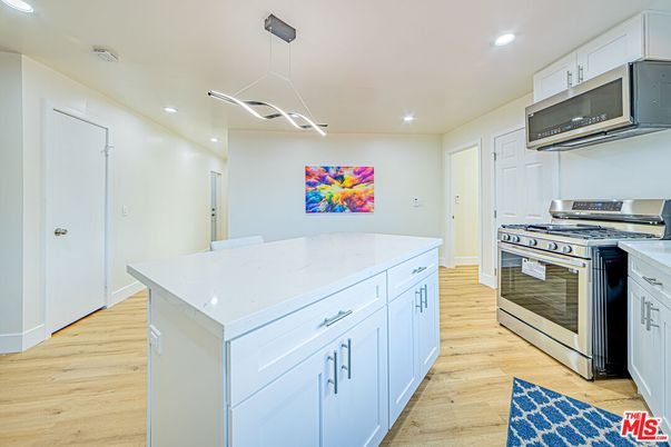 Interior, Kitchen, Pendant Lights, Recessed Lighting, Stainless Steel Appliances, Wood Texture Flooring