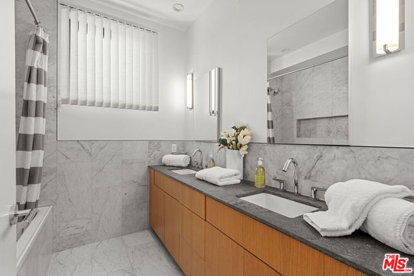 Bathroom, Dual Sink Vanities, Interior, Marble, Marble Walls, Recessed Lighting