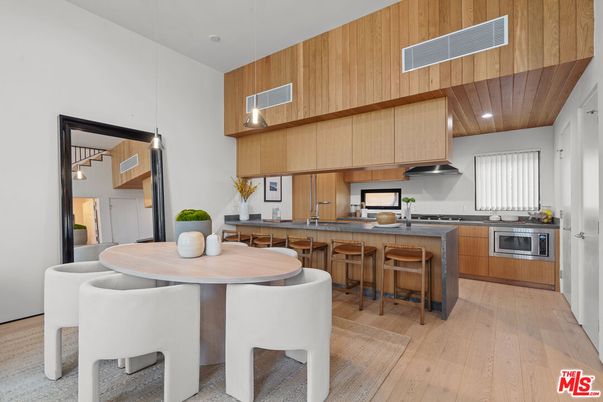 Dining room, Interior, Kitchen, Pendant Lights, Recessed Lighting, Stainless Steel Appliances, Wood Texture Flooring