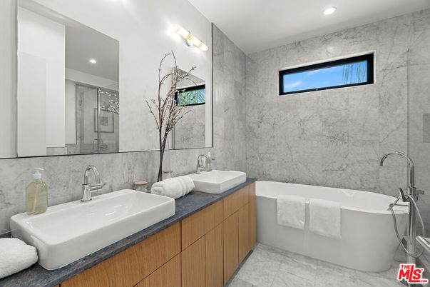Bathroom, Dual Sink Vanities, Free Standing Baths, Interior, Marble, Marble Walls, Recessed Lighting