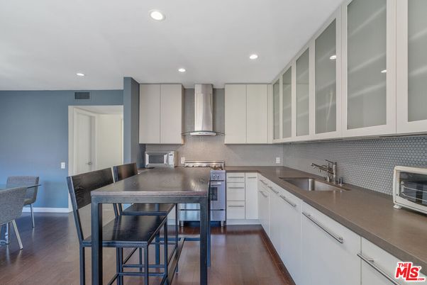 Dining room, Interior, Kitchen, Recessed Lighting, Stainless Steel Appliances, Wood Texture Flooring