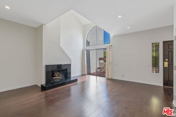Empty room, Fireplace, Interior, Recessed Lighting, Wood Texture Flooring