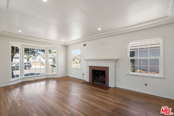 Empty room, Fireplace, Interior, Recessed Lighting, Wood Texture Flooring
