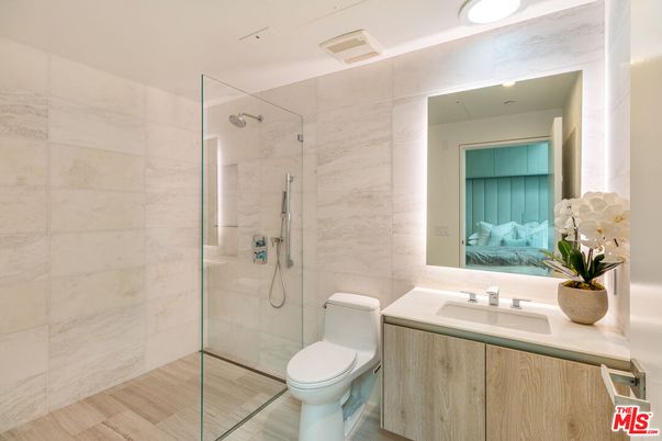 Bathroom, Glass Shower, Interior, Marble Walls, Recessed Lighting, Wood Texture Flooring