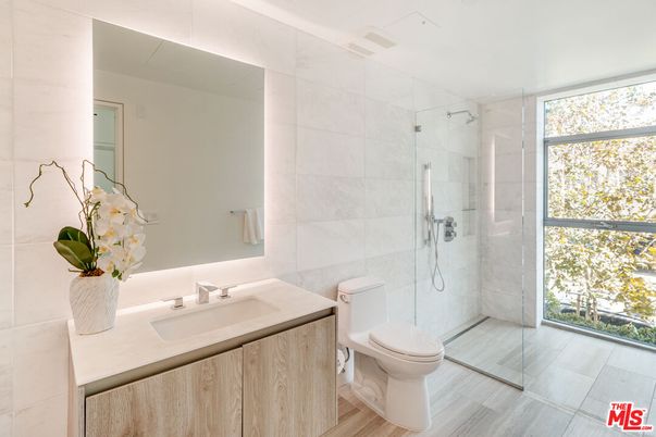Bathroom, Glass Shower, Interior, Marble Walls, Wood Texture Flooring