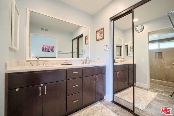Bathroom, Dual Sink Vanities, Glass Shower, Interior, Recessed Lighting, Wood Texture Flooring