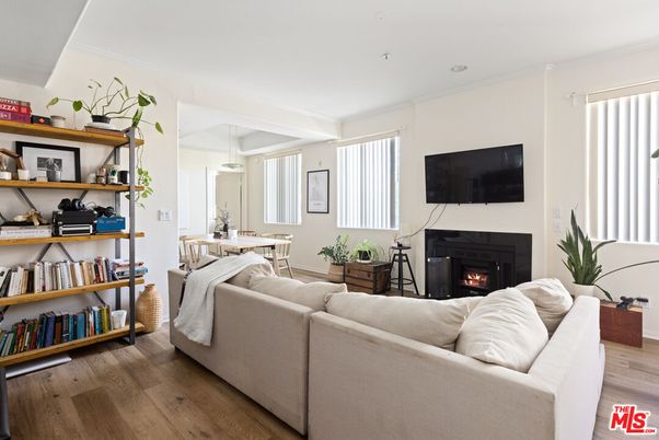 Dining room, Fireplace, Interior, Living room, Pendant Lights, Recessed Lighting, Wood Texture Flooring