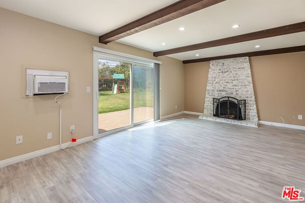 Empty room, Fireplace, Interior, Recessed Lighting, Wooden Beams, Wood Texture Flooring