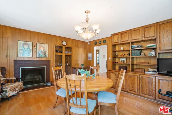 Chandelier, Dining room, Fireplace, Interior, Wood Texture Flooring, Wooden Walls