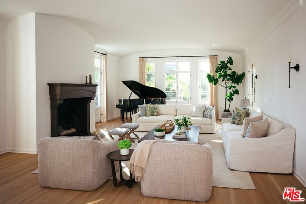 Fireplace, Interior, Living room, Piano, Recessed Lighting, Wood Texture Flooring