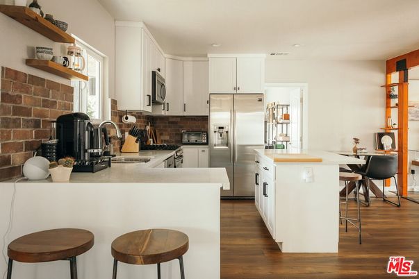 Interior, Kitchen, Recessed Lighting, Stainless Steel Appliances, Stone Walls, Wood Texture Flooring