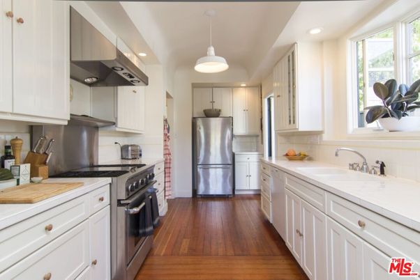 Interior, Kitchen, Pendant Lights, Recessed Lighting, Stainless Steel Appliances, Tile Countertops, Wood Texture Flooring