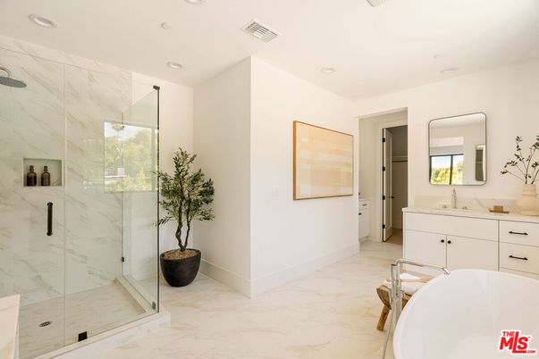 Bathroom, Dual Sink Vanities, Free Standing Baths, Glass Shower, Interior, Marble, Marble Walls, Recessed Lighting