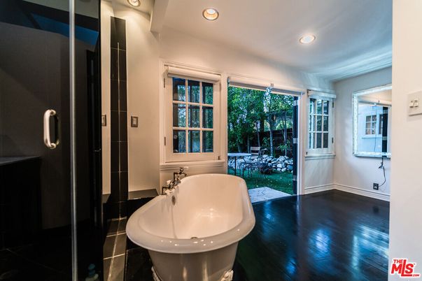 Bathroom, Free Standing Baths, Glass Shower, Interior, Recessed Lighting, Wood Texture Flooring