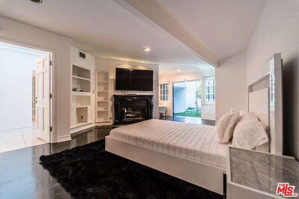 Bedroom, Fireplace, Interior, Recessed Lighting, Wood Texture Flooring