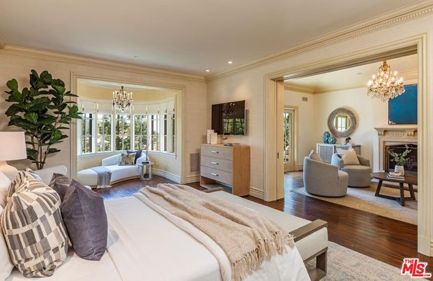 Bedroom, Chandelier, Fireplace, Interior, Recessed Lighting, Wood Texture Flooring
