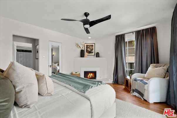 Bedroom, Fireplace, Interior, Recessed Lighting, Wood Texture Flooring