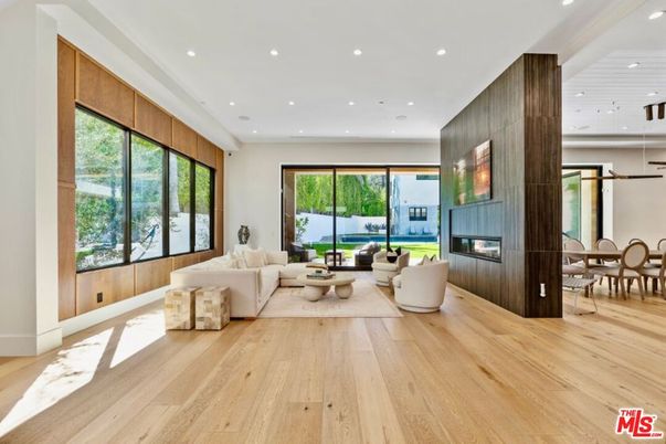 Dining room, Fireplace, Interior, Living room, Pendant Lights, Recessed Lighting, Wood Texture Flooring, Wooden Walls