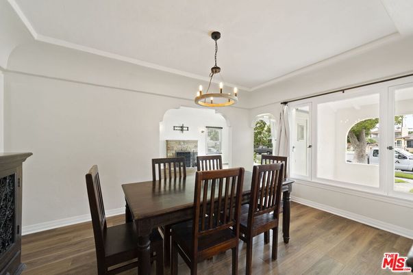 Chandelier, Dining room, Fireplace, Interior, Pendant Lights, Wood Texture Flooring