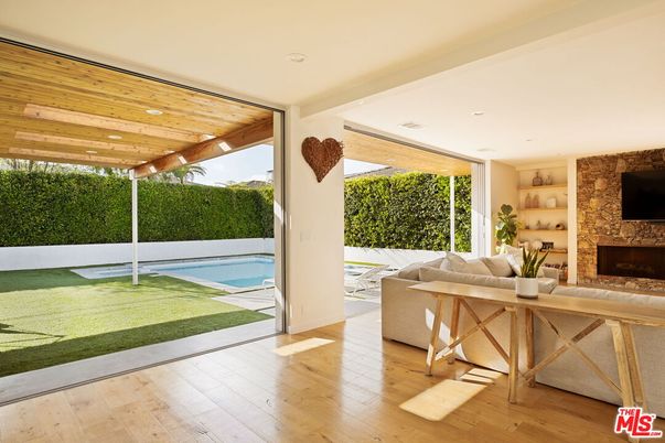 Fireplace, Interior, Living room, Pool, Recessed Lighting, Stone Walls, Wooden Ceilings, Wood Texture Flooring