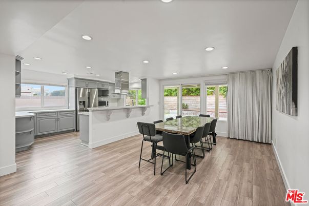 Dining room, Interior, Kitchen, Recessed Lighting, Stainless Steel Appliances, Wood Texture Flooring