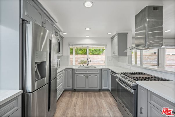Interior, Kitchen, Recessed Lighting, Stainless Steel Appliances, Wood Texture Flooring
