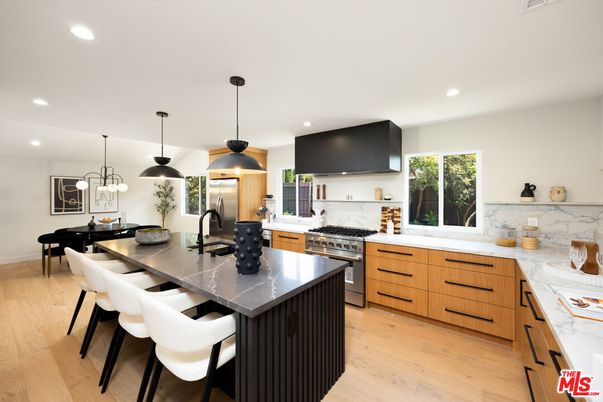 Dining room, Interior, Kitchen, Pendant Lights, Recessed Lighting, Stainless Steel Appliances, Wood Texture Flooring